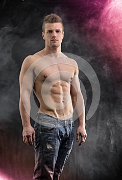Handsome young bodybuilder in relaxed pose