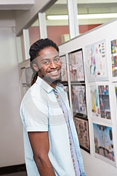 Handsome young casual businessman in office