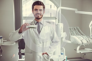 Handsome young dentist