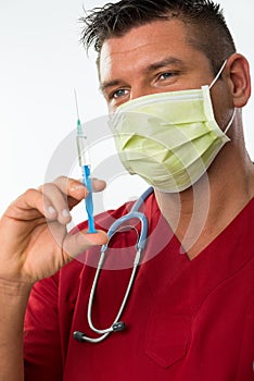 Handsome young doctor with mouth mask, stethoscope