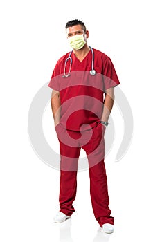 Handsome young doctor with mouth mask, stethoscope