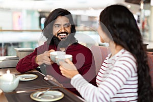 Handsome young indian guy have date with pretty lady
