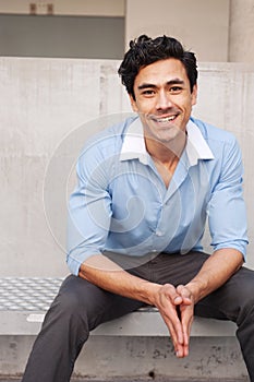 Handsome, young latino professional businessman photo