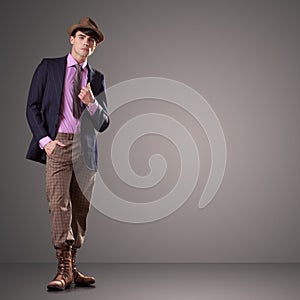 Handsome young male model posing in the studio