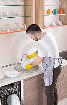 Man washing dishes