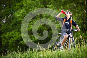 Handsome young man biking