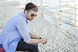 Handsome young man in bluejeans