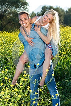 Handsome young man with his pretty girlfriend.