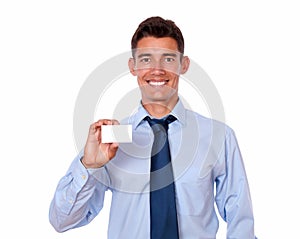 Handsome young man holding blank business card