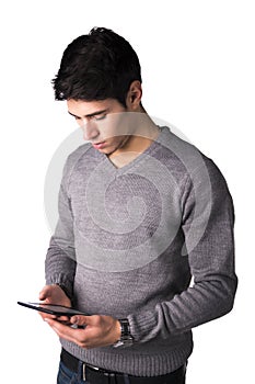 Handsome young man holding ebook reader