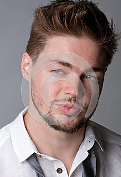 Handsome Young Man with Loosened Tie