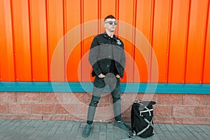 Handsome young man model with black sunglasses