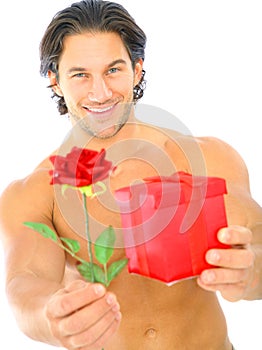 Handsome Young Man Offering Red Rose And Present