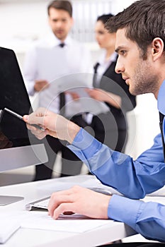 Handsome young man participating at training course