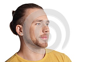 Handsome young man posing on white background