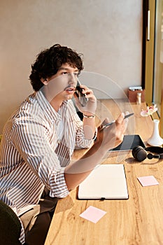 Charming young man engaged in conversation