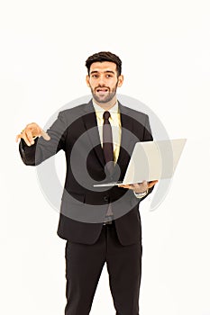 A handsome young man standing on a tablet isolated on white background