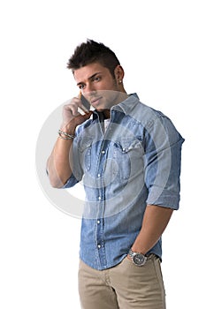 Handsome young man talking on cell phone (mobile), isolated