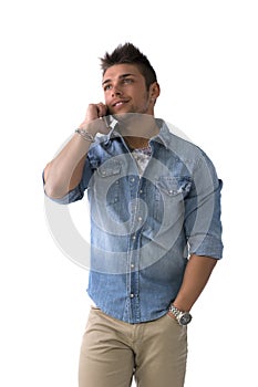 Handsome young man talking on cell phone (mobile), smiling