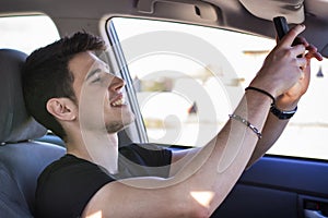 Handsome Young Man Talking Selfie Inside a Car