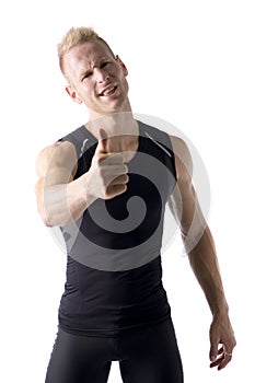 Handsome young man with thumb up doing OK sign