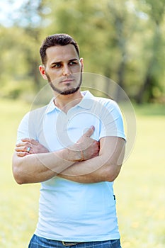 Handsome young man in white t-shirt outdoor in. Lifestyle, human