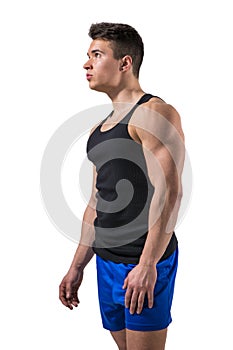 Handsome young muscular man looking at camera