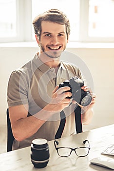 Handsome young photographer