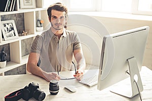 Handsome young photographer