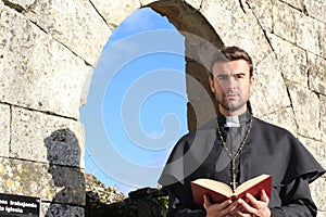 Handsome young priest close up