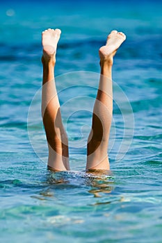 Handstand in the ocean