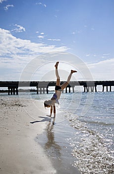 Handstands on the beach