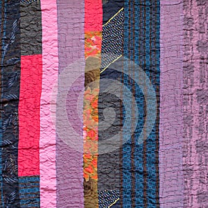 handstitched patchwork cloth from various stripes