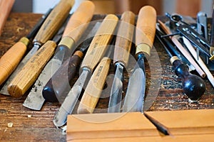 Handtools on a workbench.