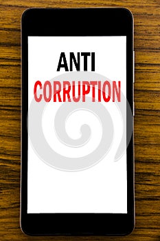 Handwriting Announcement text showing Anti Corruption. Business concept for Bribery Corrupt Text Written on mobile phone cellphone