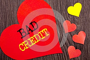 Handwriting Announcement text showing Bad Credit. Concept meaning Poor Bank Rating Score For Loan Finance written on Heart Love on