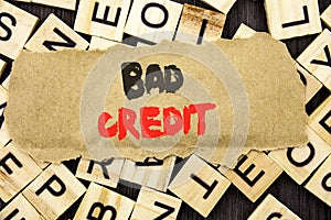 Handwriting Announcement text showing Bad Credit. Concept meaning Poor Bank Rating Score For Loan Finance written on tear paper no