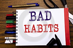 Handwriting Announcement text showing Bad Habits. Business concept for Improvement Break Habitual Hebit Written on notebook, woode