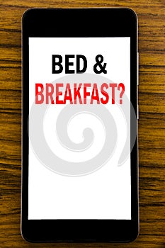 Handwriting Announcement text showing Bed Breakfast. Business concept for Holiday Journey Travel Written on mobile phone cellphon