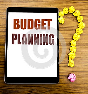 Handwriting Announcement text showing Budget Planning. Business concept for Financial Budgeting Written on tablet with wooden back