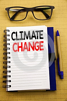 Handwriting Announcement text showing Climate Change. Business concept for Global Planet Warming Written on tablet laptop, wooden