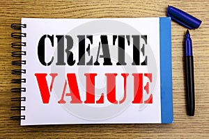 Handwriting Announcement text showing Create Value. Business concept for Creating Motivation Written on notepad note paper backgro photo