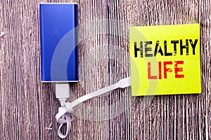 Handwriting Announcement text showing Healthy Life. Business concept for Good Health Food written on sticky note with copy space o