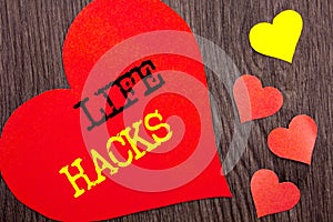 Handwriting Announcement text showing Life Hacks. Concept meaning Solution Hacking Hack Trick To Help Efficiency written on Heart