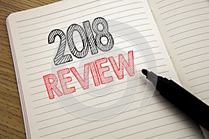 Handwriting Announcement text showing 2018 Review. Business concept for Feedback On Progress written on notebook with copy space o