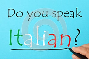 Handwriting Do you speak Italian? on a blue background. Business Concept