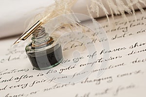 Handwriting,ink and quill pen photo