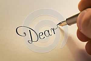 Handwriting letter with pen photo