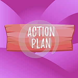 Handwriting text Action Plan. Concept meaning proposed strategy or course of actions for certain time Plank wooden board blank