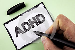 Handwriting text Adhd. Concept meaning Learning made easier for children teaching no more a difficult task written by Man on White
